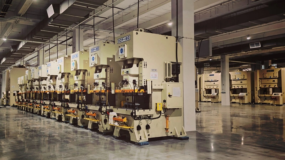 Sheet metal forming production line with presses running embossed custom sheet metal parts